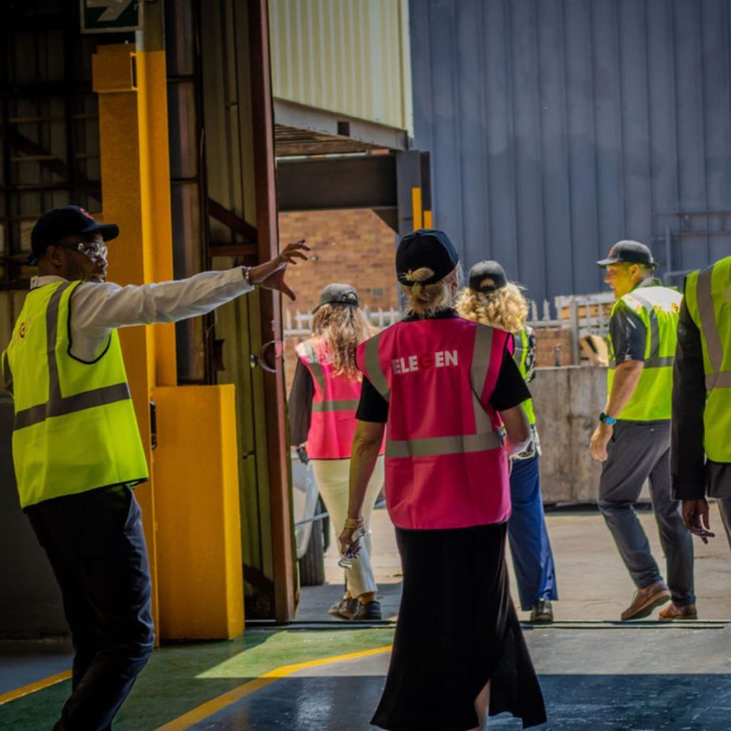 Elegen-Team-walking-around-factory-1
